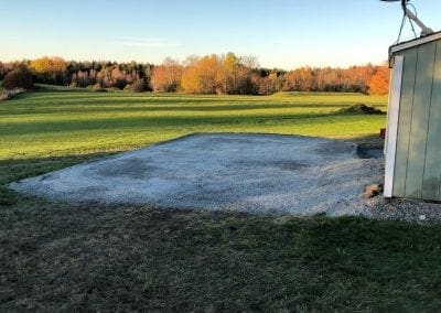 Laying down a gravel pad